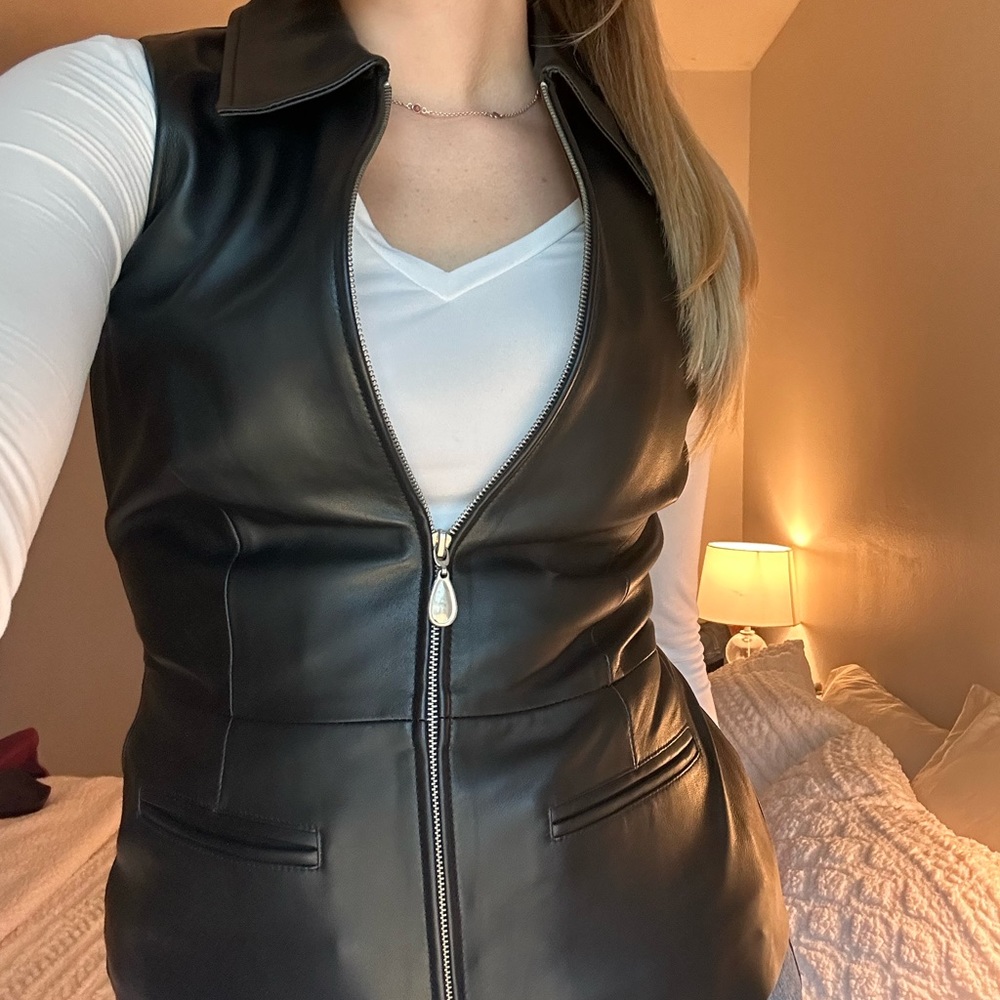 black vest, leather